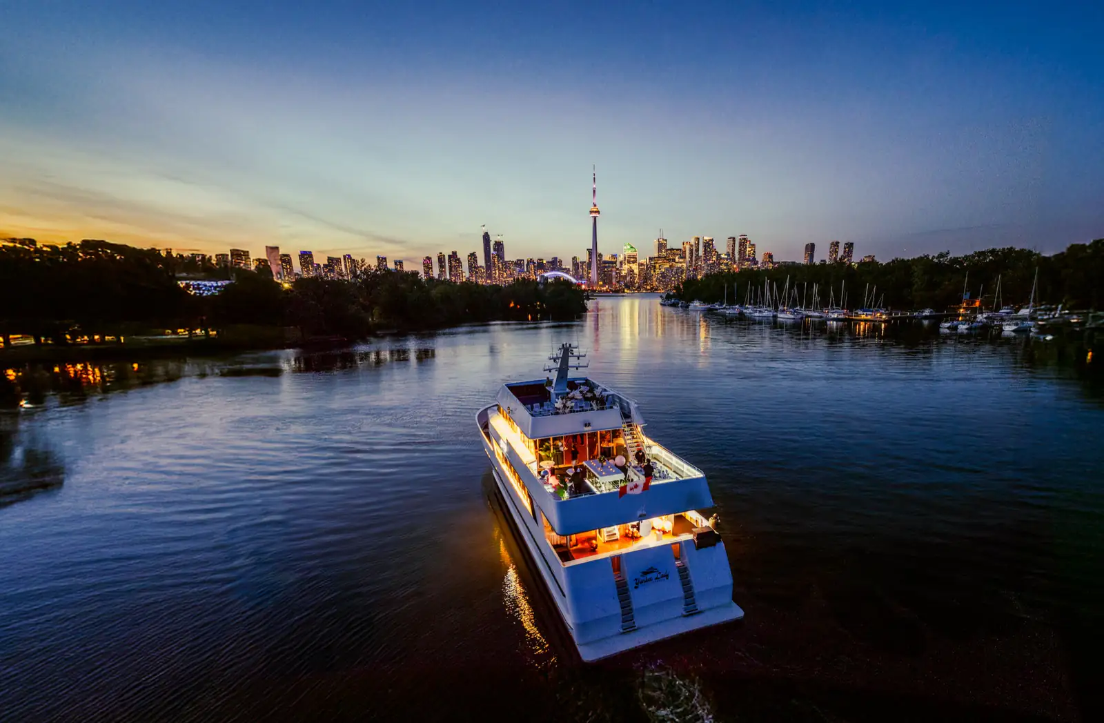 Yankee Lady returning toward the skyline at dusk