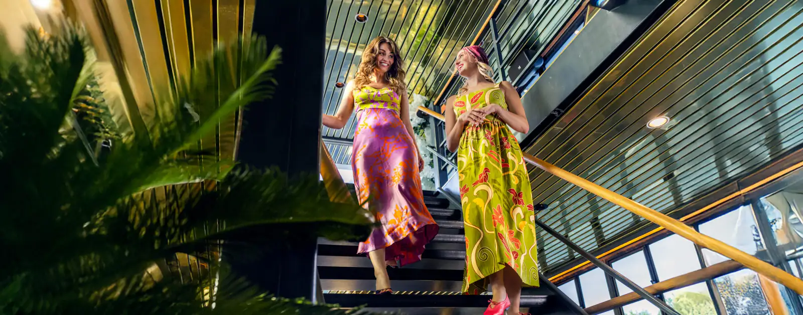 Guests descending the interior staircase aboard Yankee Lady